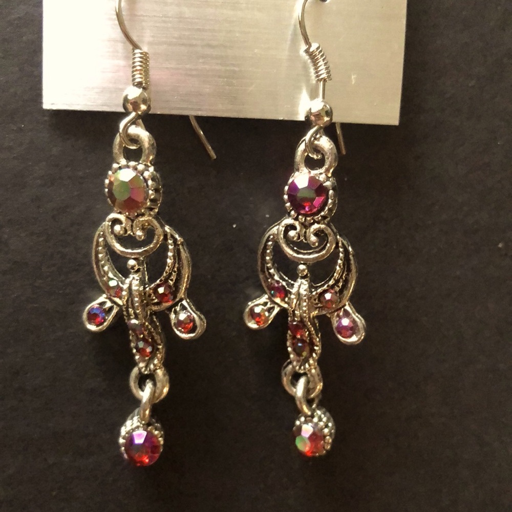 Brand new dangling pink and silver earrings